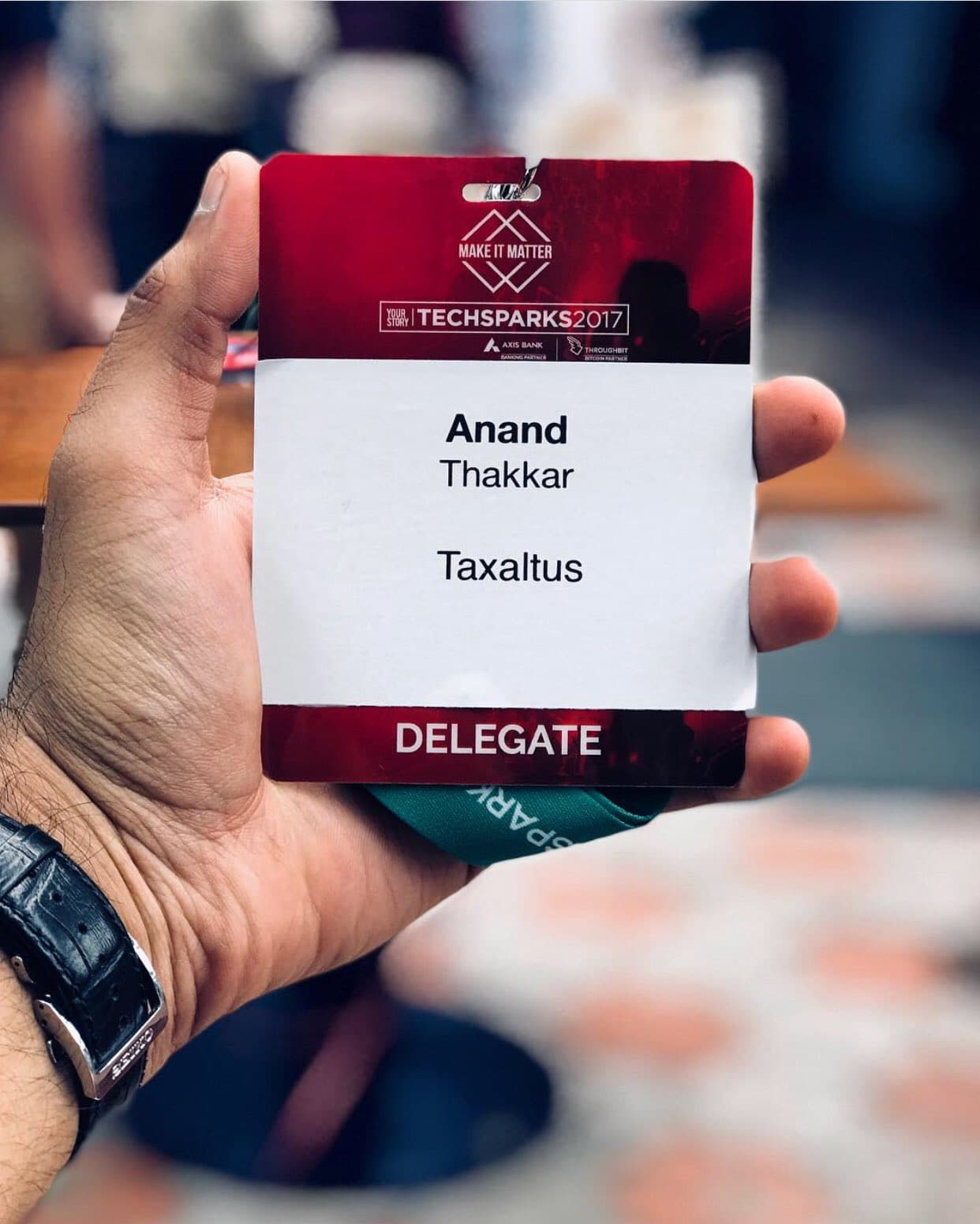 TechSparks 2017 delegate badge with Anand Thakkar representing Taxaltus, Bengaluru